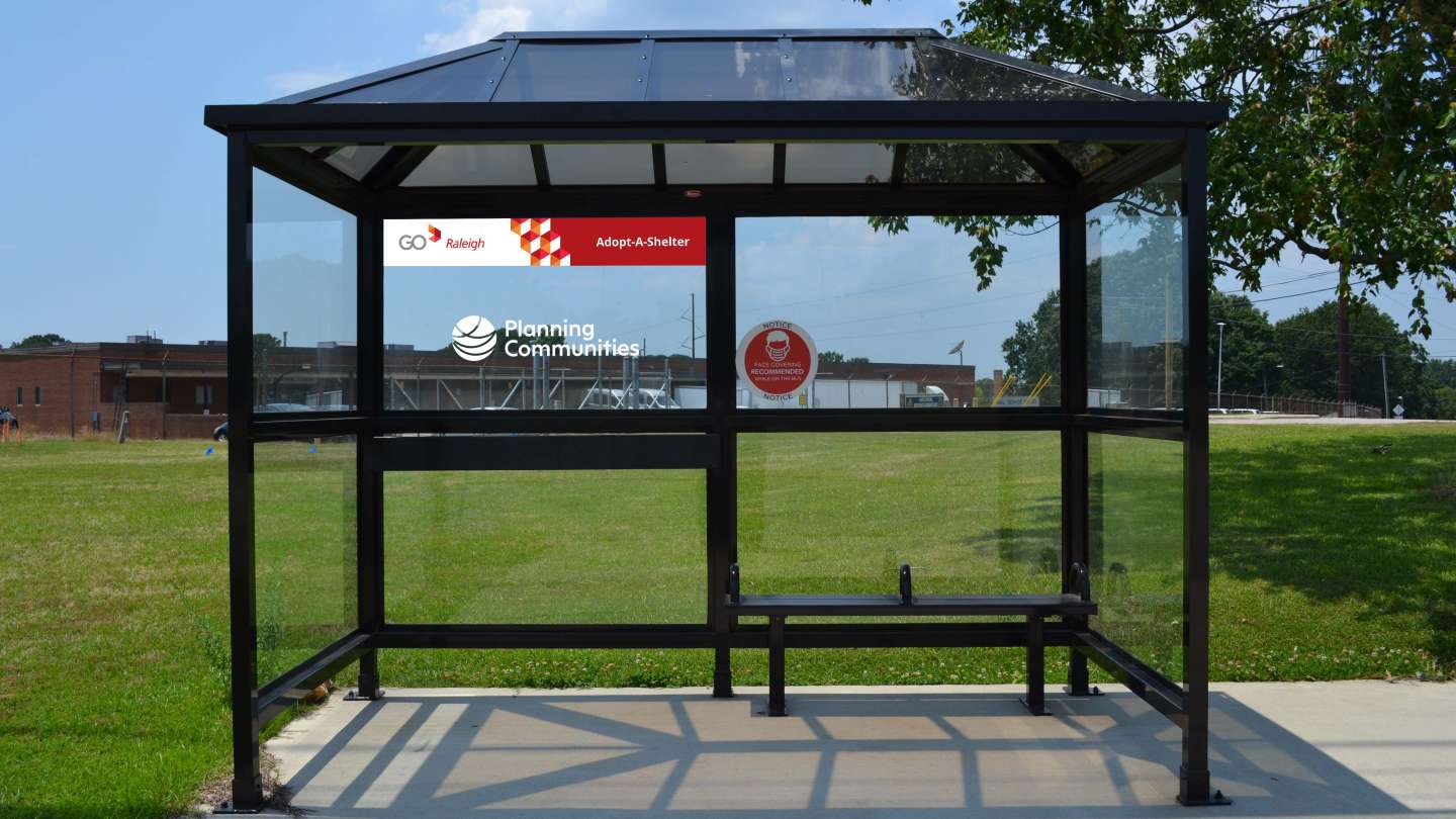 GoRaleigh Black Bus Shelter with Sign